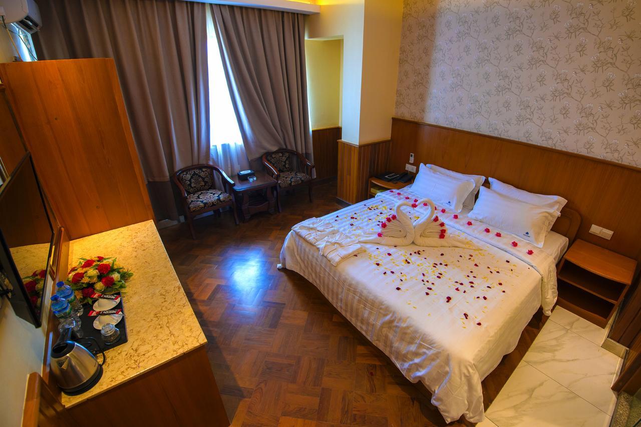 Unity Hotel Mandalay Bagian luar foto